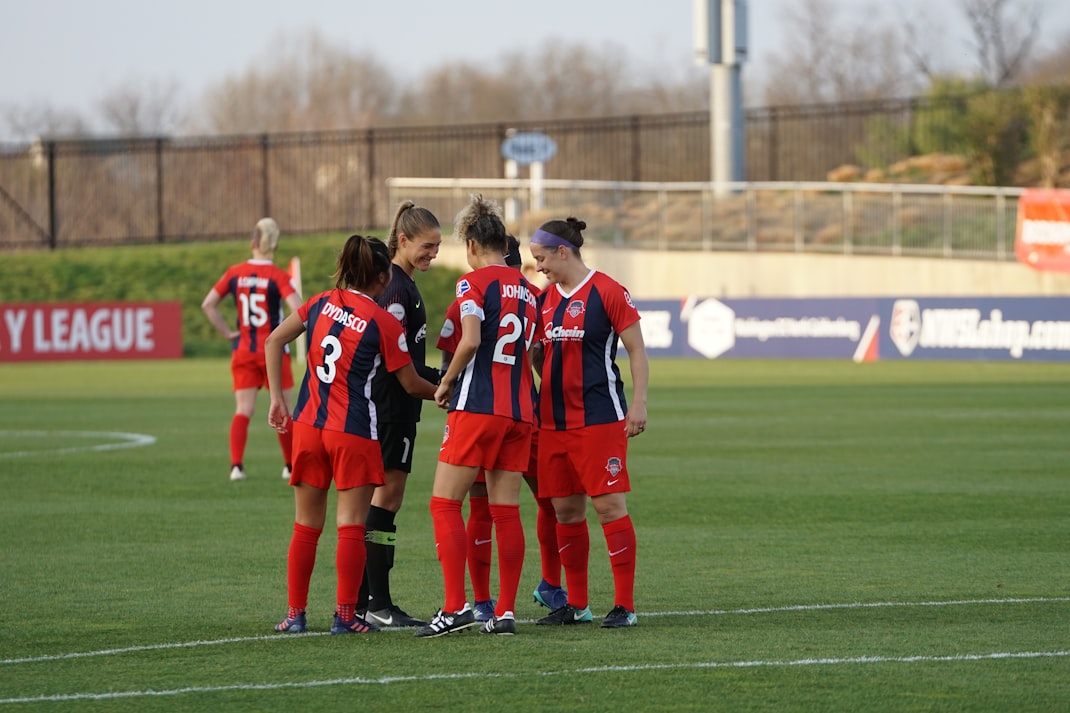 Women playing soccer