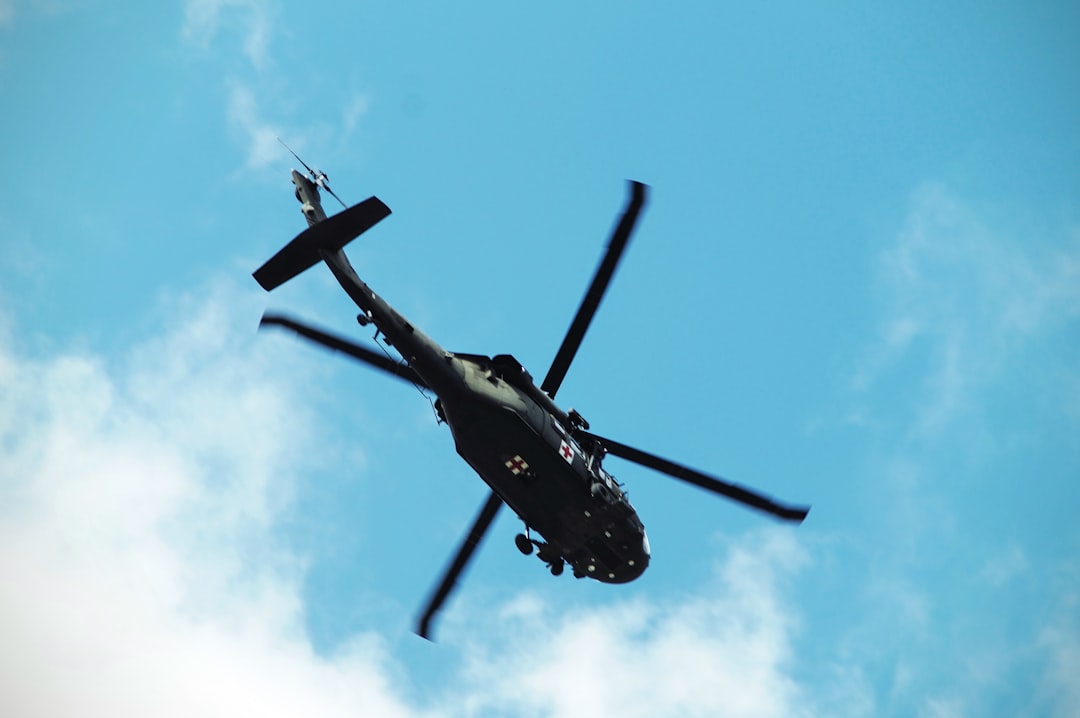 low angle photo of black and green helicopter, Military Medical Helicopter