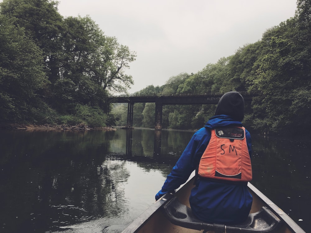 person riding on boat