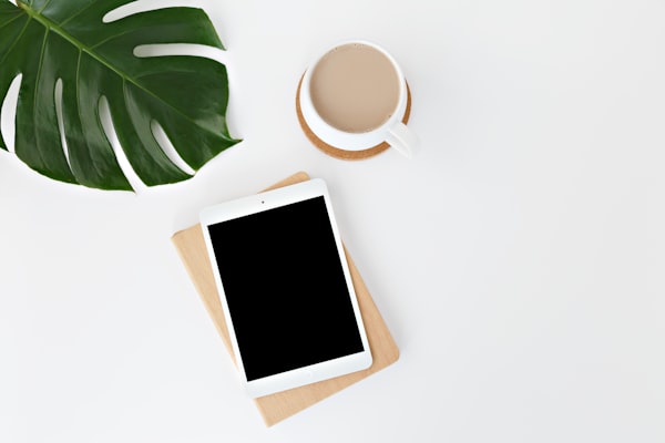 Tablet, palm leaf, coffee mug