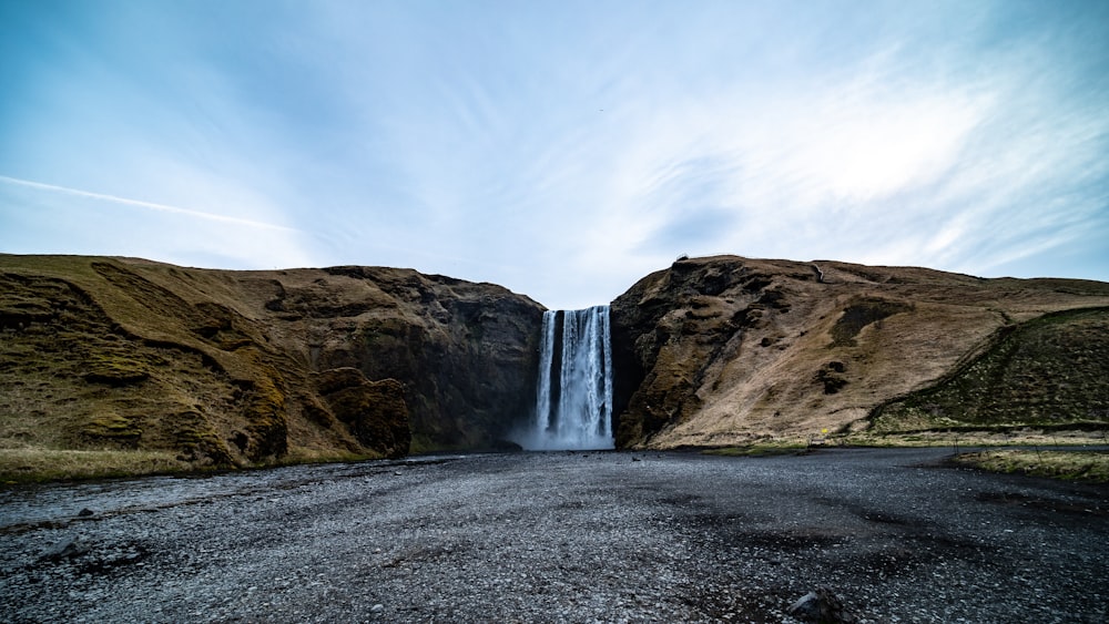 waterfalls between rock formation