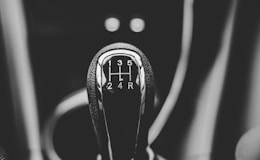 focus photography of car shift gear