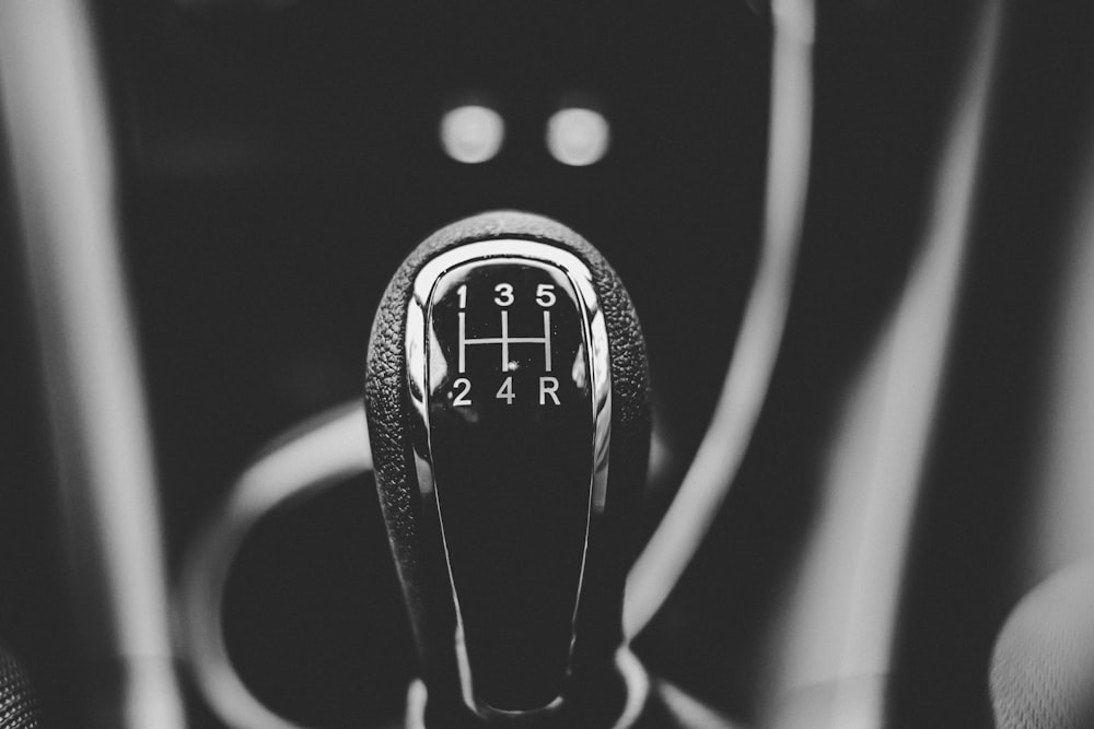 focus photography of car shift gear