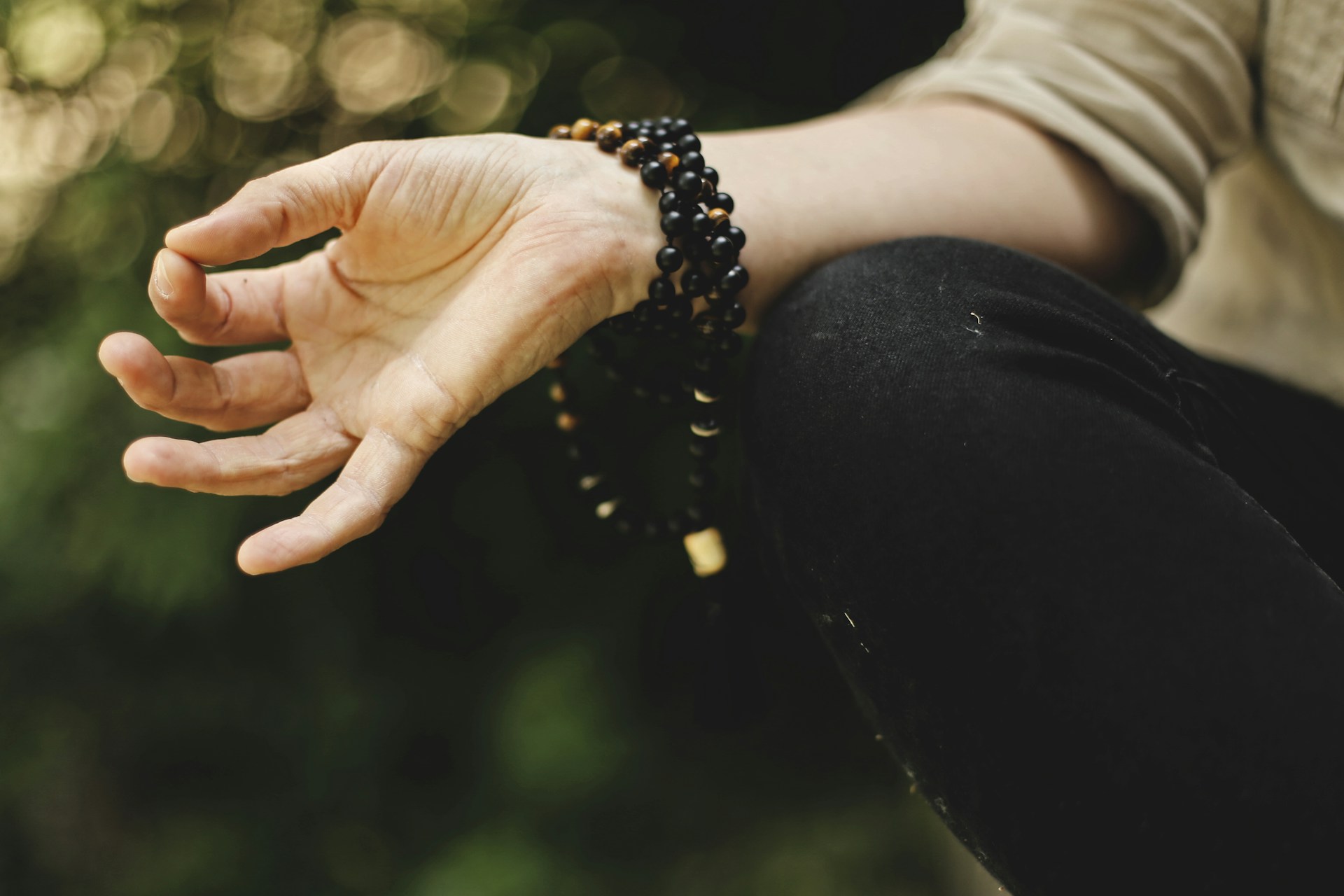 person doing meditation outdoors