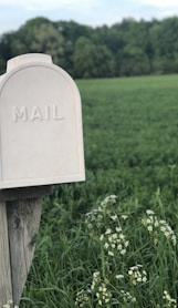 shallow focus photography of gray mailbox