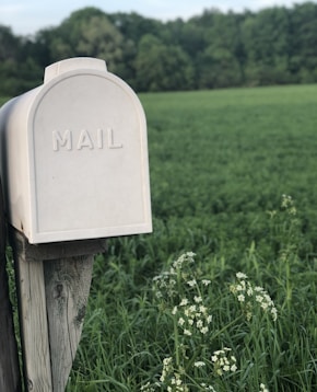 shallow focus photography of gray mailbox