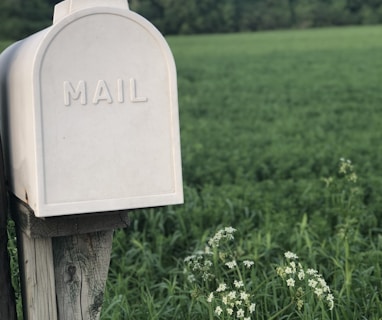 shallow focus photography of gray mailbox