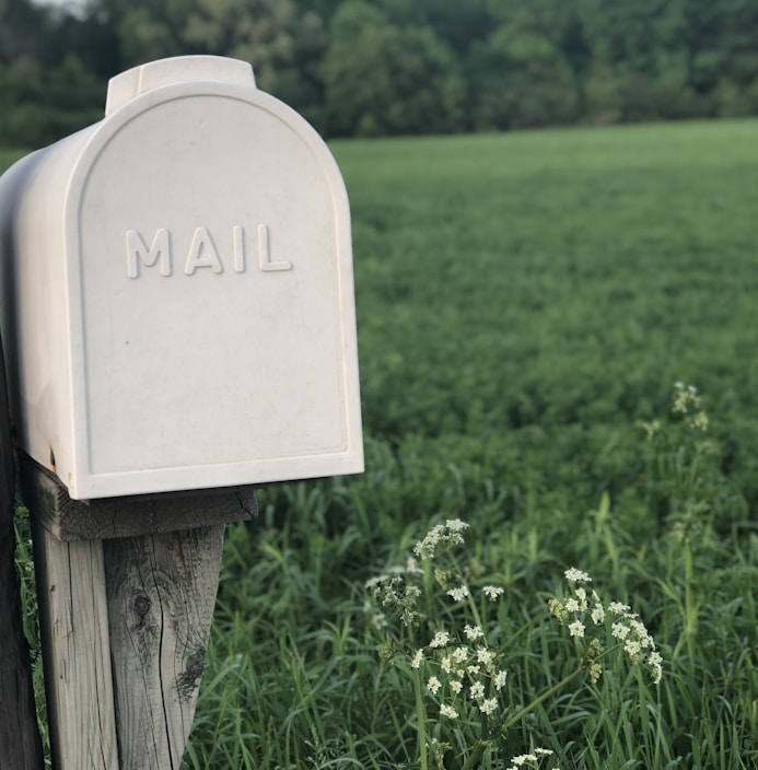 shallow focus photography of gray mailbox