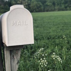 shallow focus photography of gray mailbox