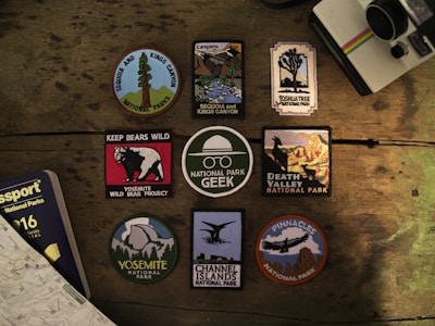 assorted textile patches on wooden surface