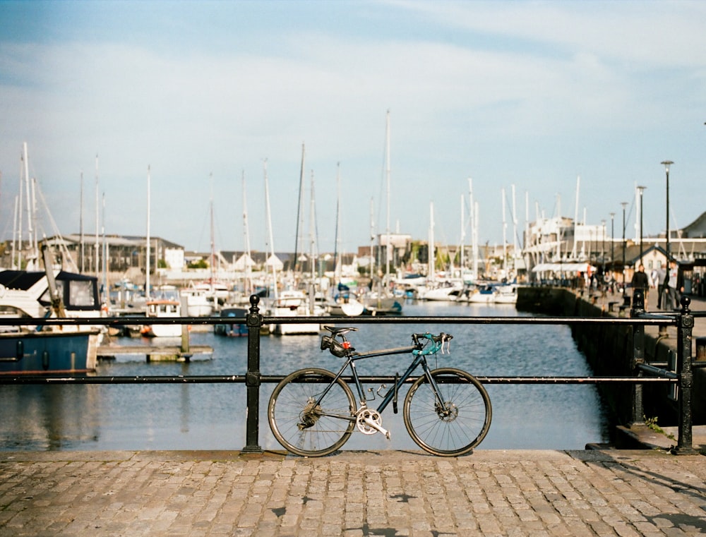 black bike parked near black railings