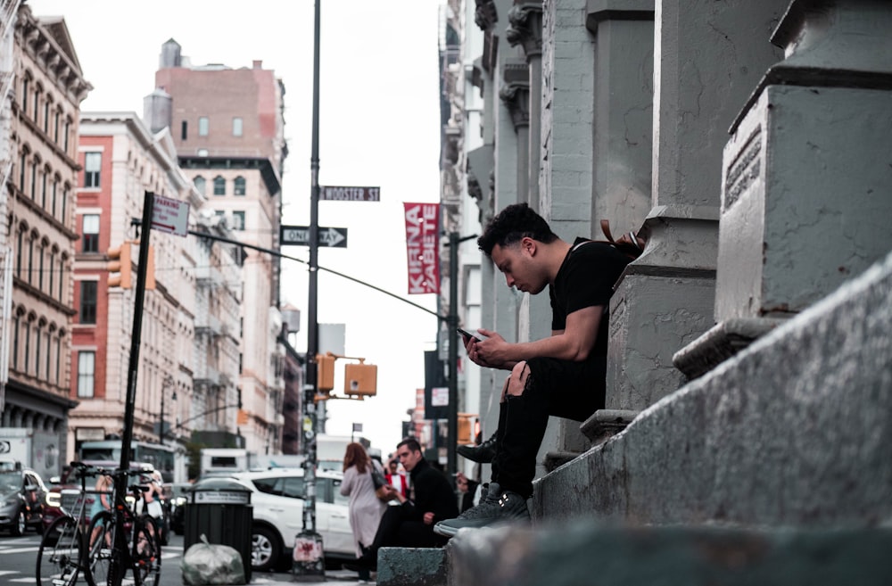 man taking selfie on road