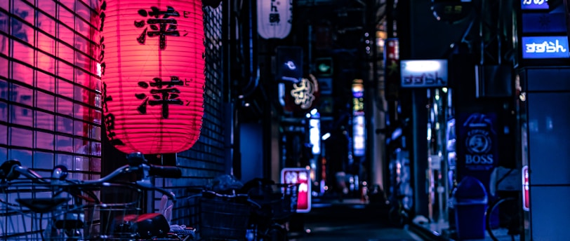 Japanese lantern over city bike at nighttime