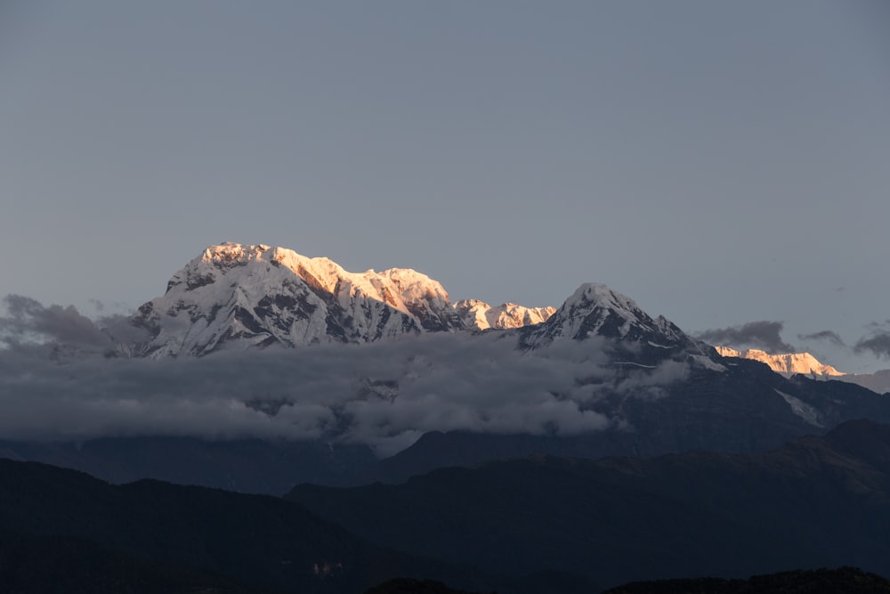 snow mountain under cloudy sky