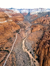 an aerial view of a river running through a canyon