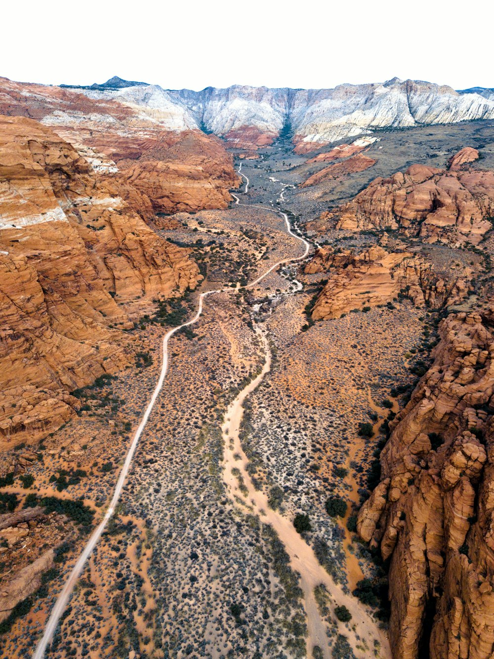 an aerial view of a river running through a canyon