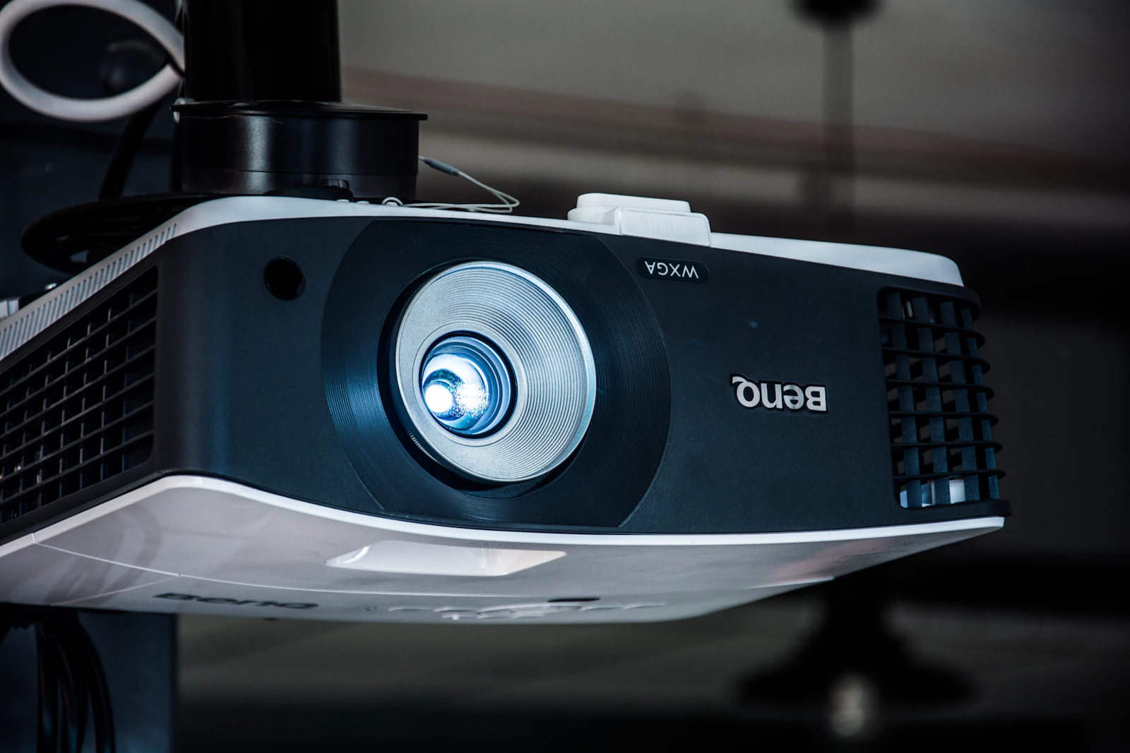 Portable projector creating a movie image in a rented living room
