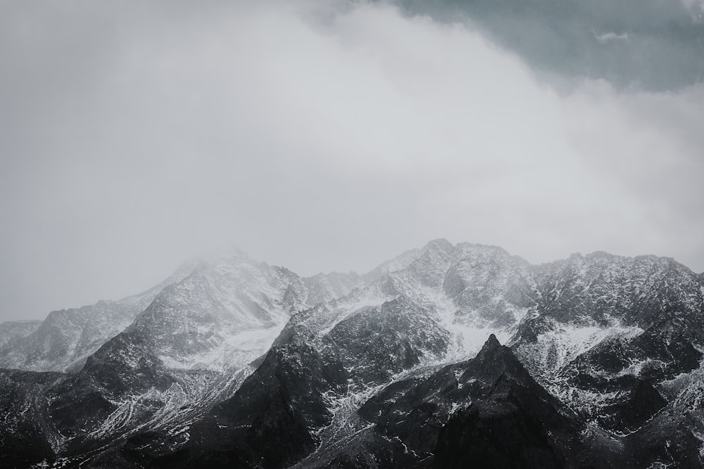 mountains under fog