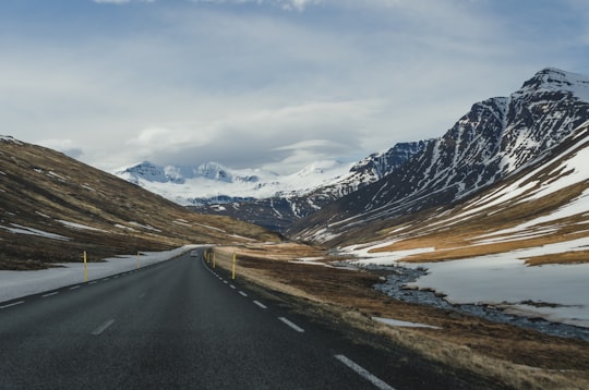 road surrounded of mountain in Reyðarfjörður Iceland
