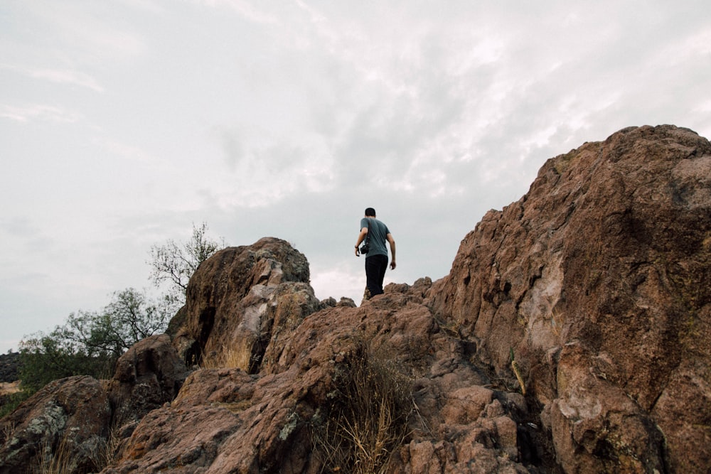 man standing near cliff