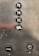 A metallic panel with elevator buttons labeled P6, P4, P2, and GAL in a vertical alignment. Below the buttons, there is a black button labeled ALARM and a keyhole labeled as FIREMANS SERVICE.
