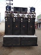 A sound system setup at an outdoor event.