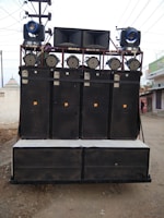 An outdoor setup featuring speakers for a party atmosphere.