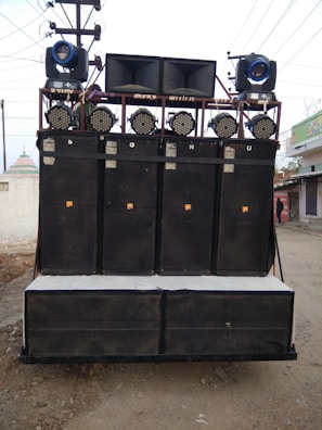 An outdoor setup featuring speakers for a party atmosphere.