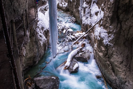 river near rock cliff in Partnach Gorge Germany