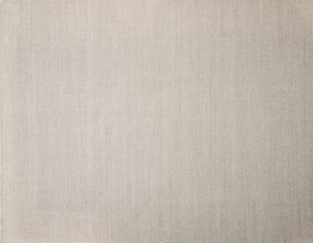 Canvas texture coated by white primer. Linen background Stock