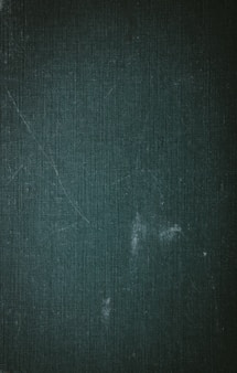 a black and white photo of a blackboard
