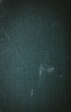 a black and white photo of a blackboard