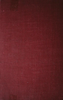 a close up of a red book cover
