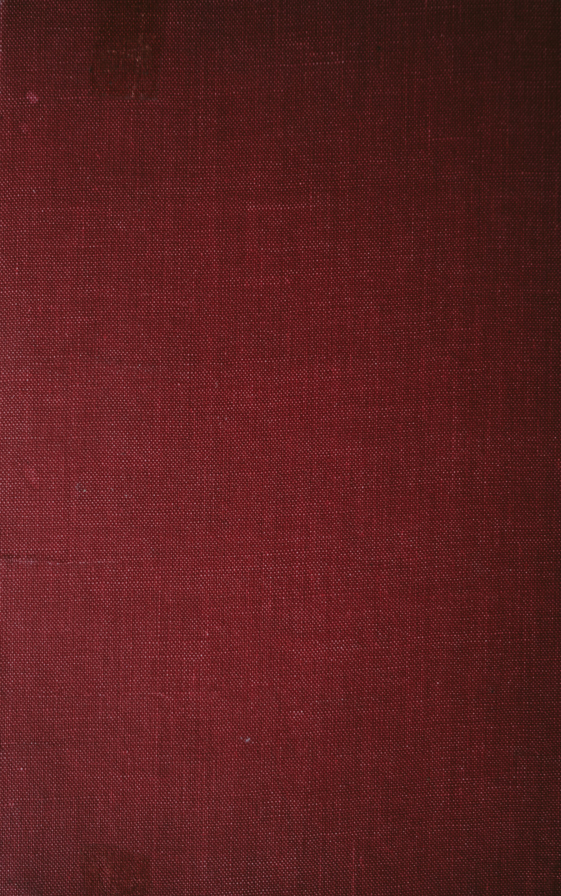 a close up of a red book cover