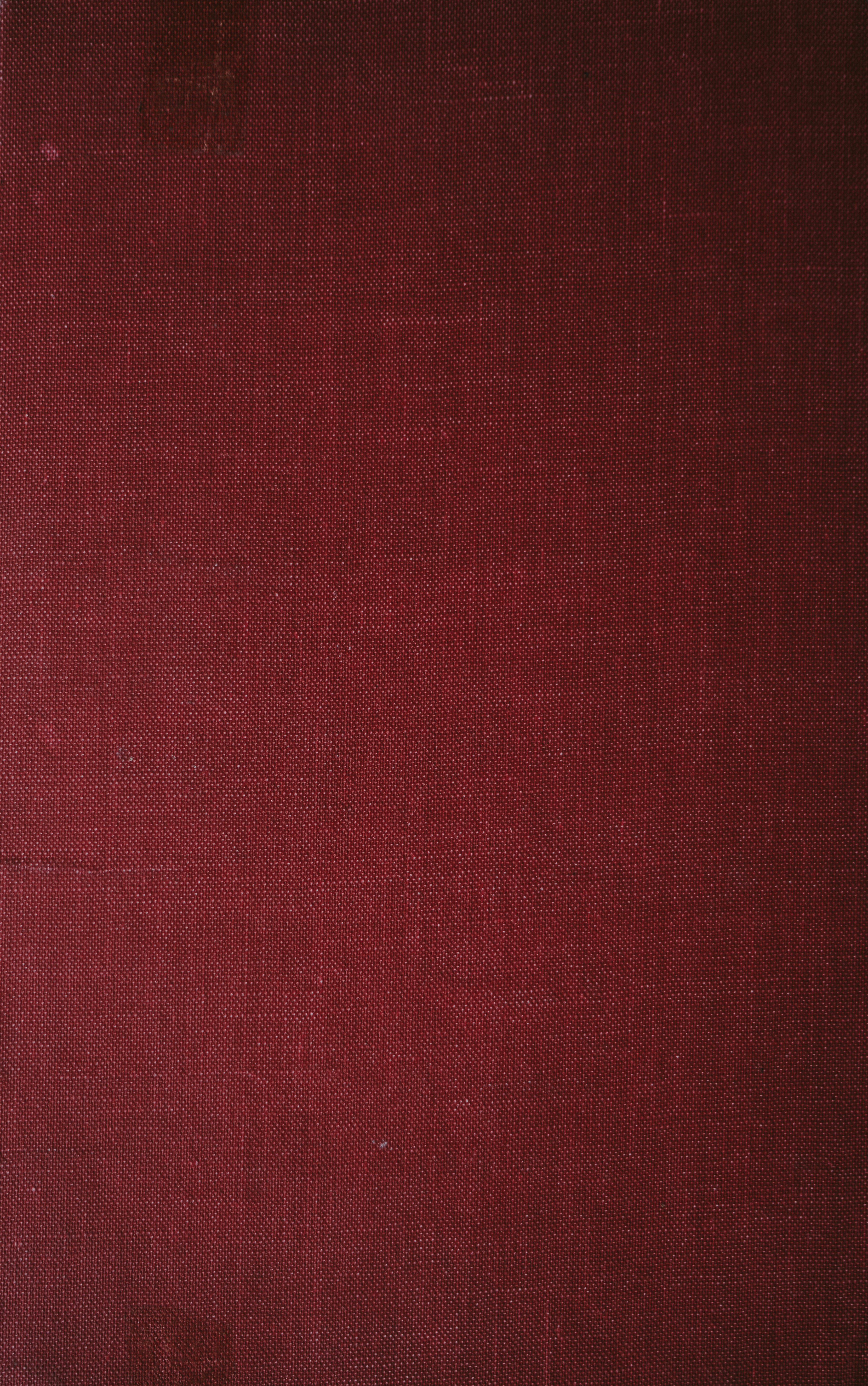 a close up of a red book cover