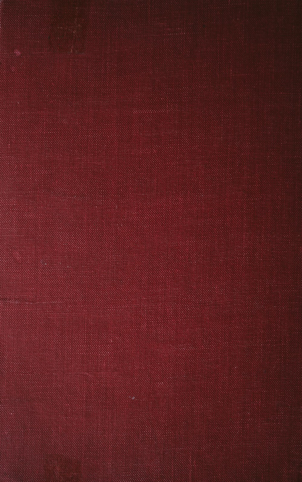 um close up de uma capa de livro vermelho