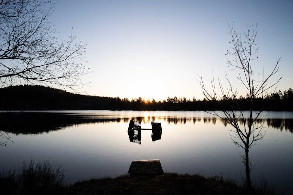 body of water during sunset