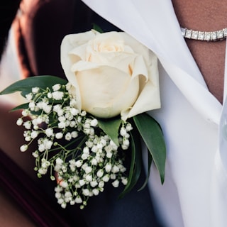 A close-up of a rose-inspired accessory.