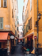 concrete pathway between buildings