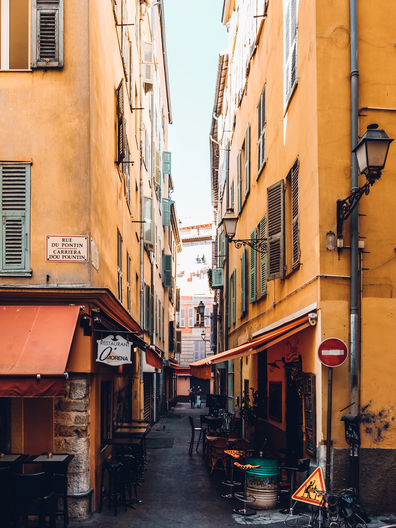 A warm ochre Riviera street near the Mediterranean coast