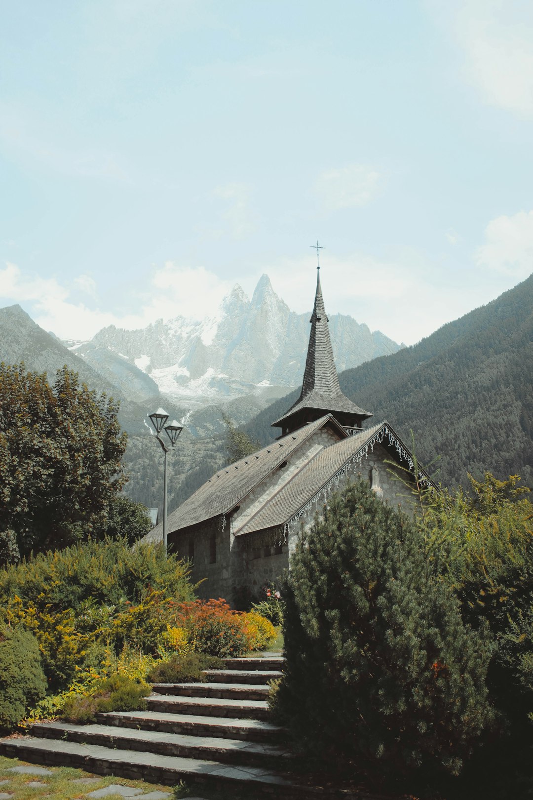 gray church beside mountain