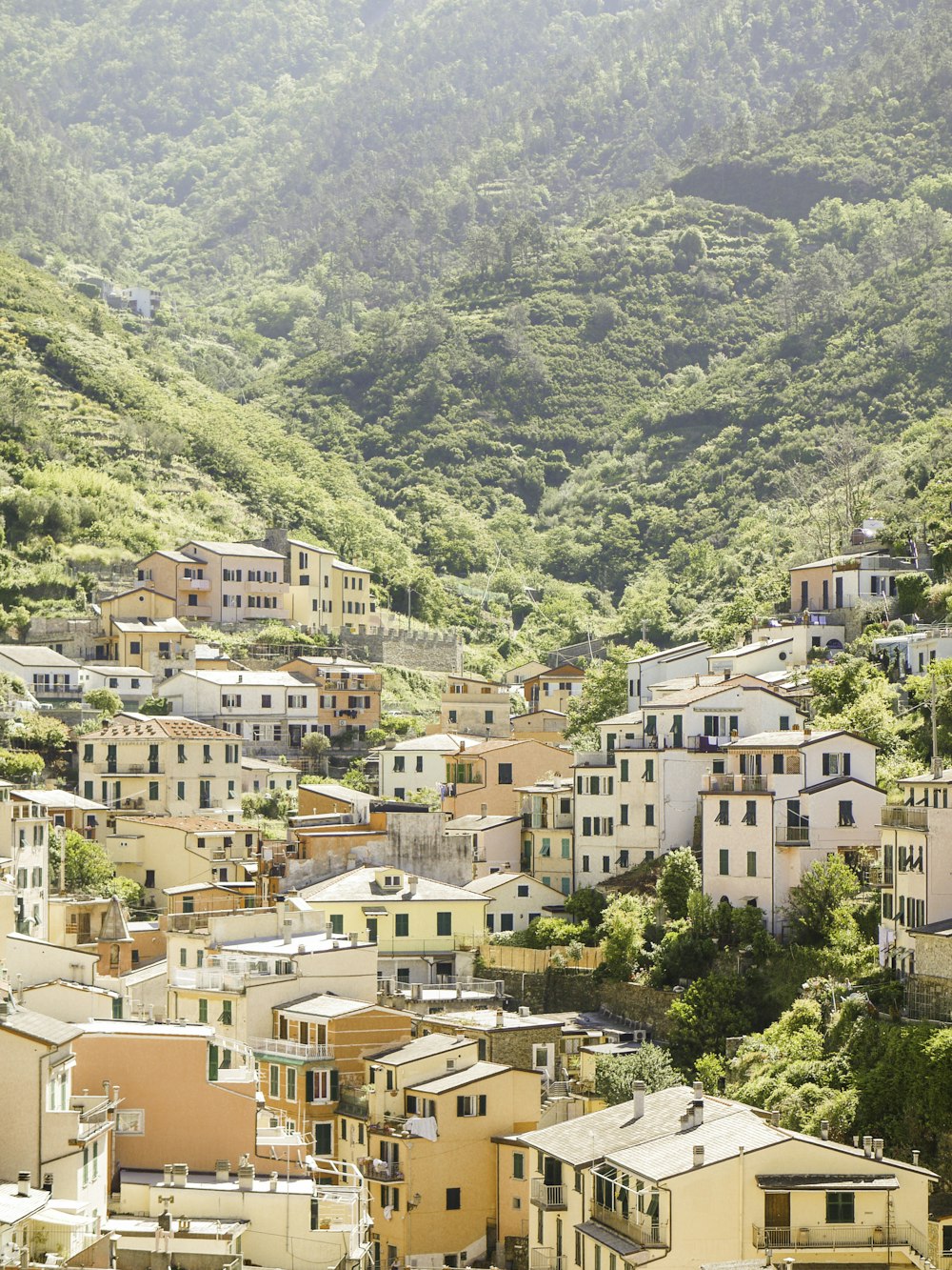 beige concrete village in mountain valley