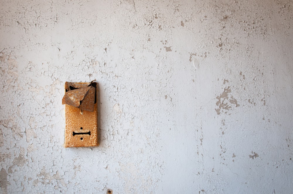 a wall with a light switch on it