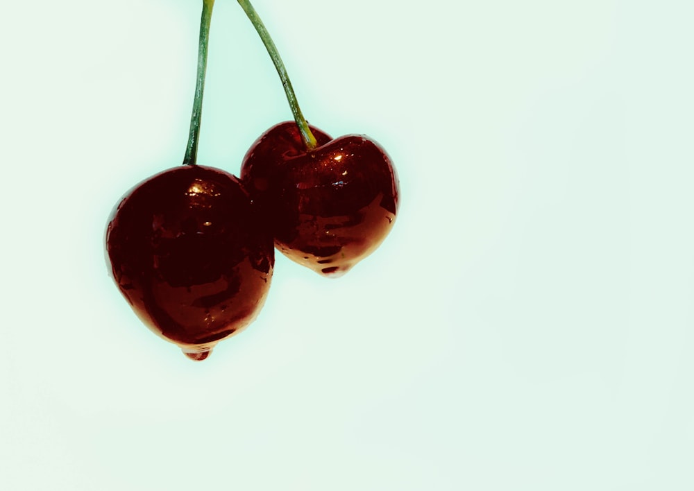 two ripe cherries