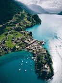 bird's eye view photography of boat on body of water