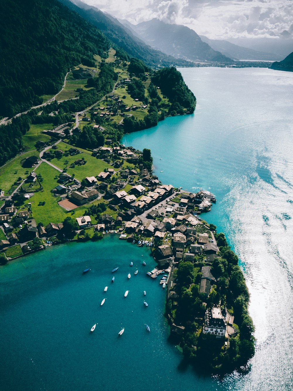 bird's eye view photography of boat on body of water