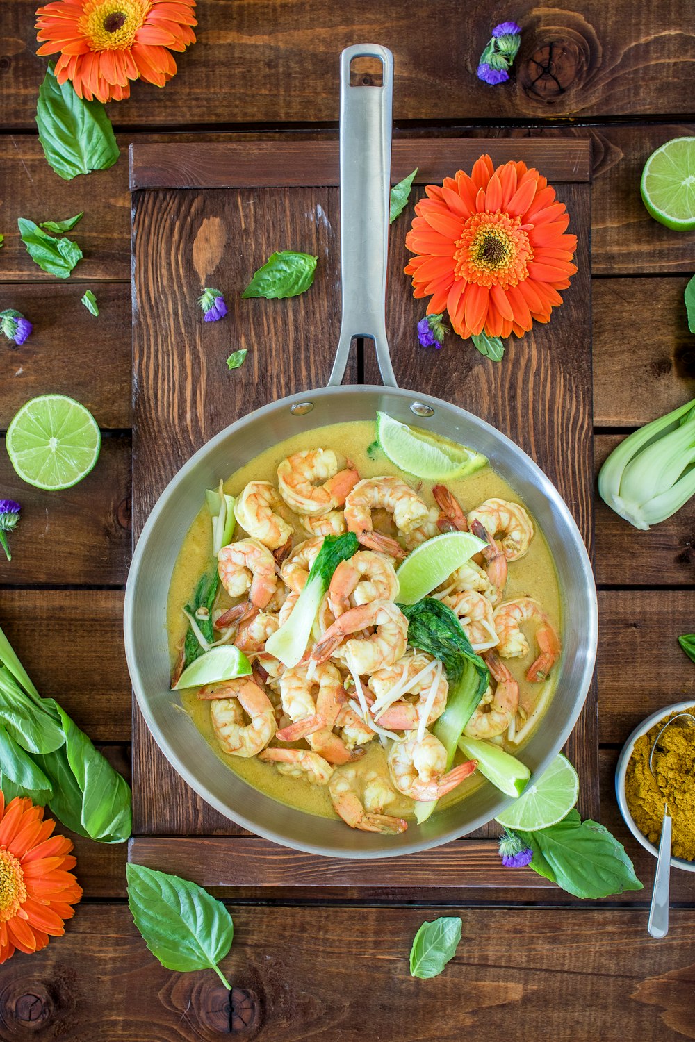 cooked shrimps in stainless steel sauce pan in top view photography