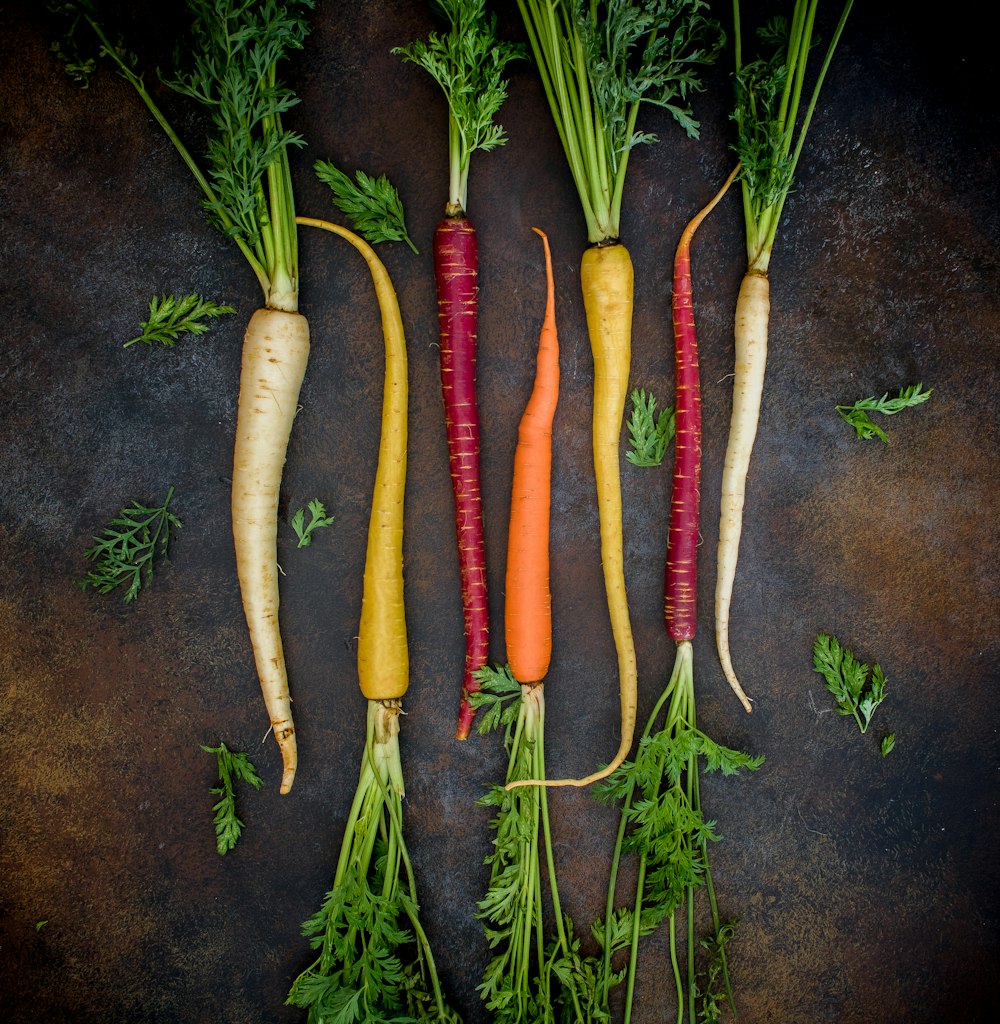 seven assorted varieties of baby carrots