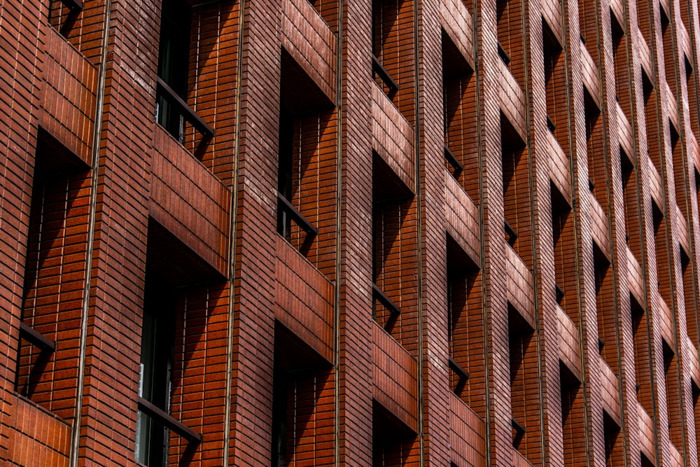 low angle photography of brick building