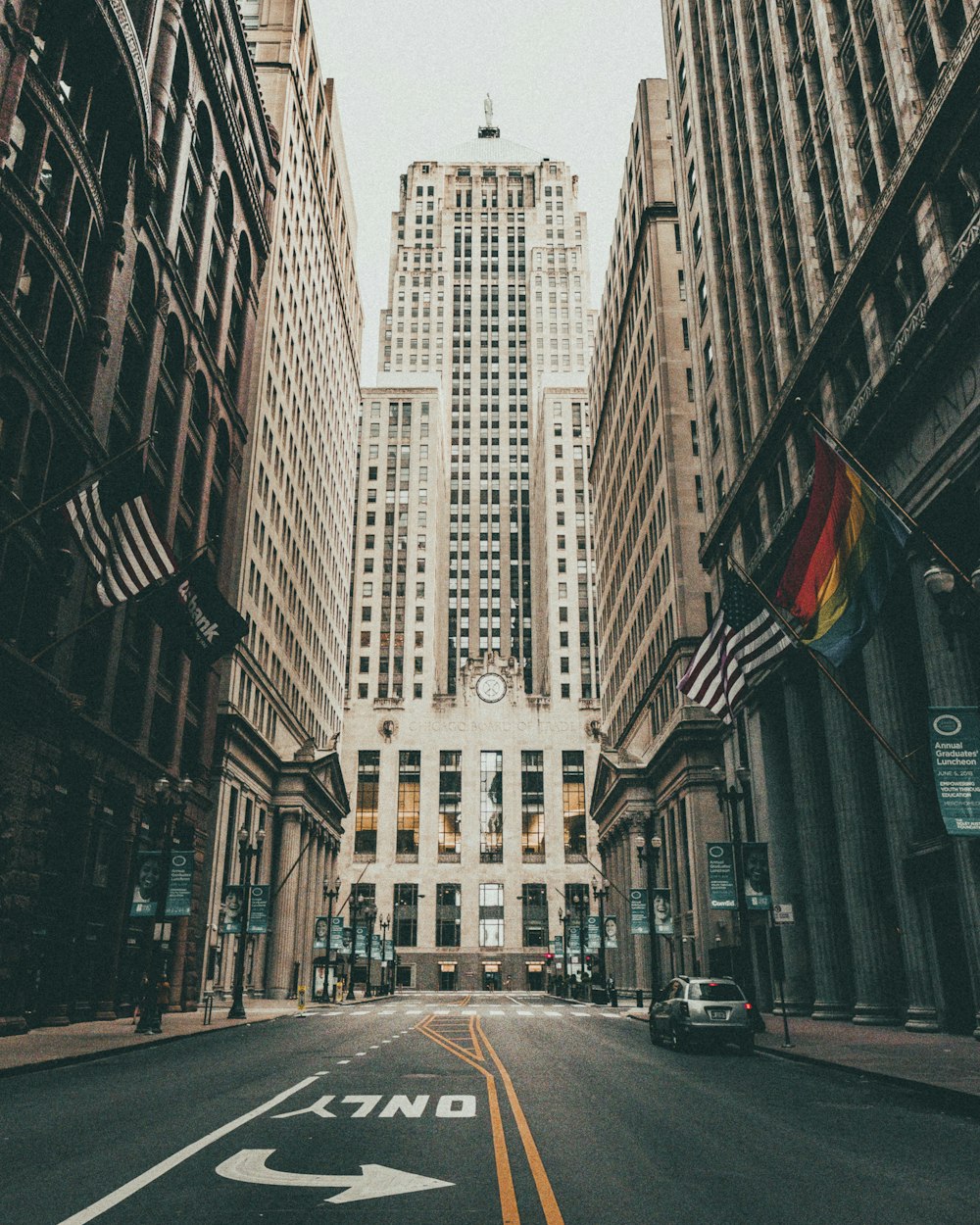 asphalt road between high-rise building